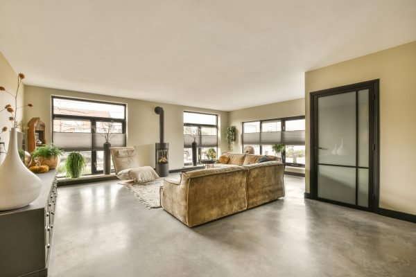 a living room with a couch and a fireplace
